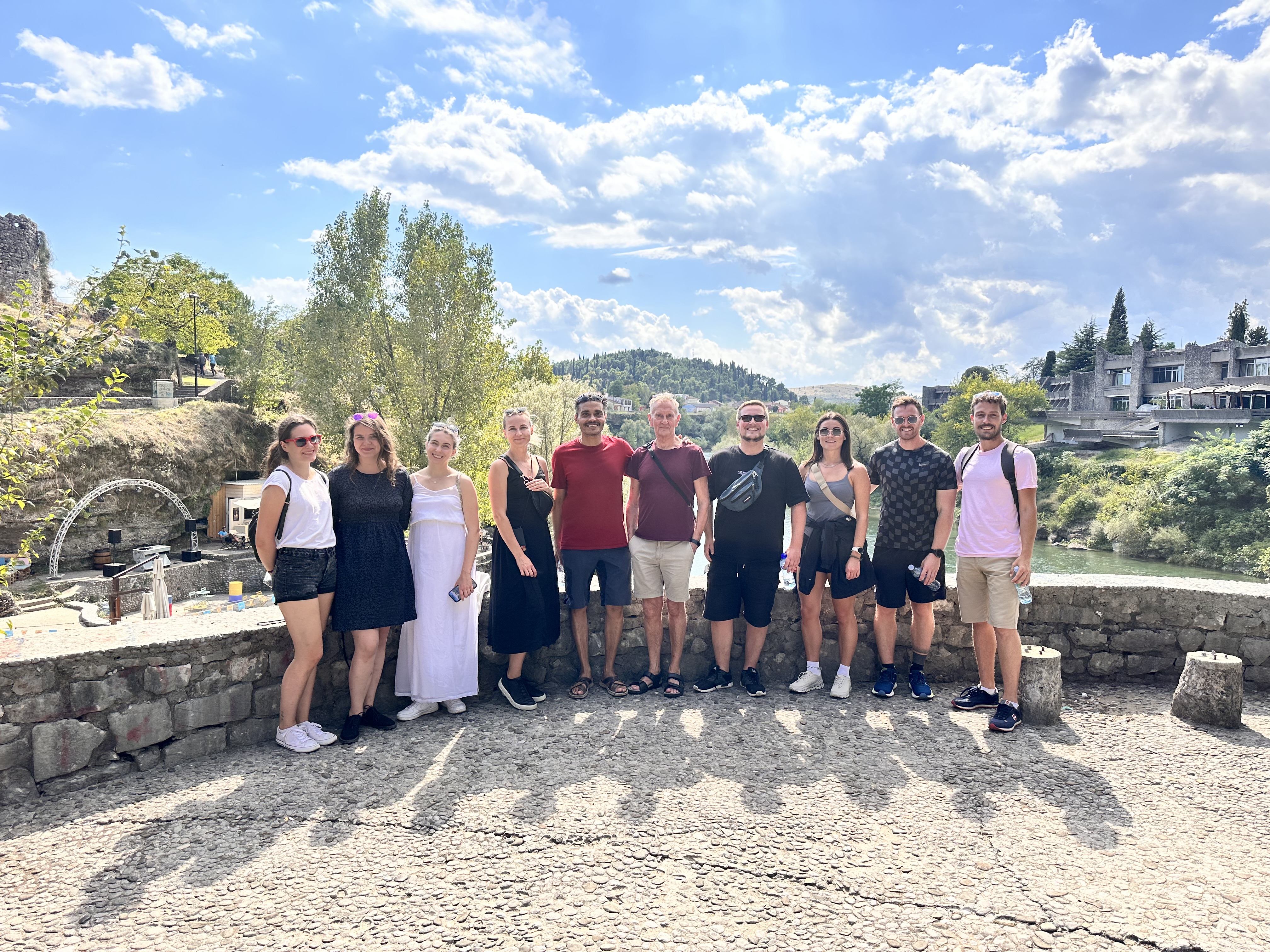 Group of tourist at Sastavci spot looking at Depedogen fortress, Old Ribnica bridge and Hotel Podgorica.